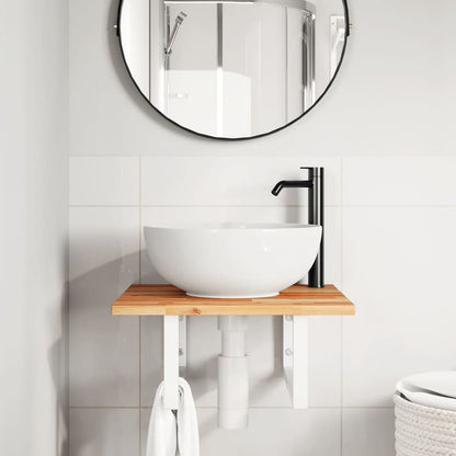 The wall mounted basin shelf unit with a basin and towel in a bathroom setting
