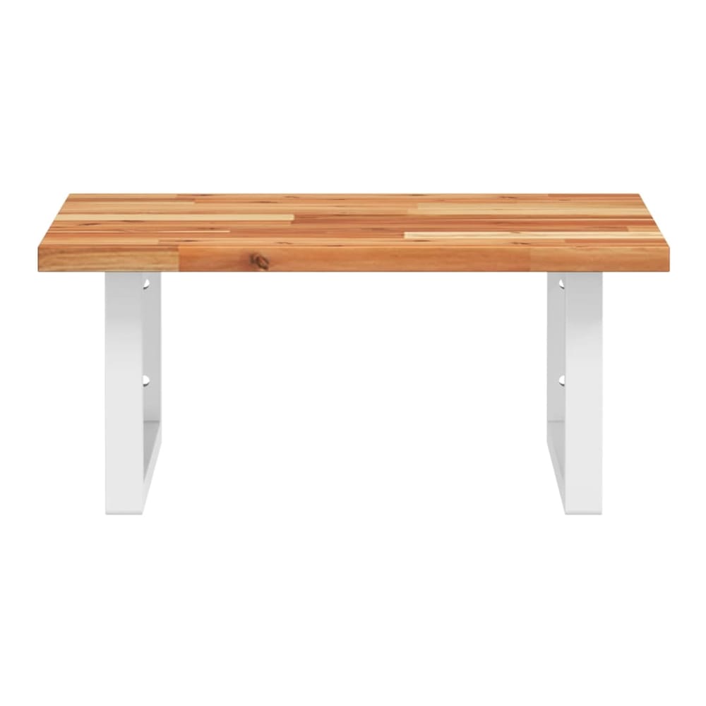 A close up of the solid wood acacia top of the wall mounted shelf unit
