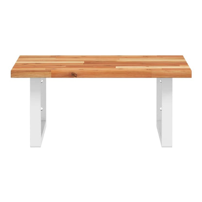 A close up of the solid wood acacia top of the wall mounted shelf unit
