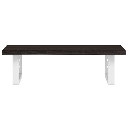 Close up of the dark wood top and white metal frame of the basin shelf