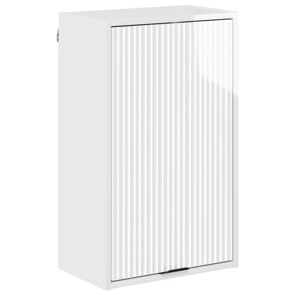 The bathroom vanity unit with a closed door featuring a ribbed texture