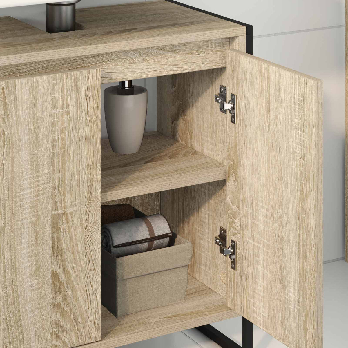 Close up of the open doors of the bathroom vanity unit, showing storage shelves and a soap dispenser