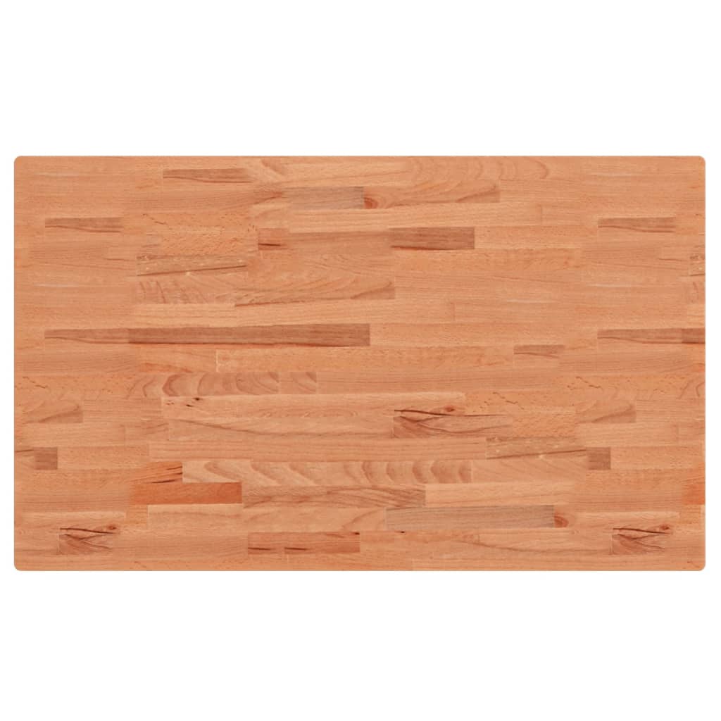 The solid wood beech countertop showing its plank construction and natural grain