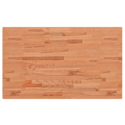 The solid wood beech countertop showing its plank construction and natural grain