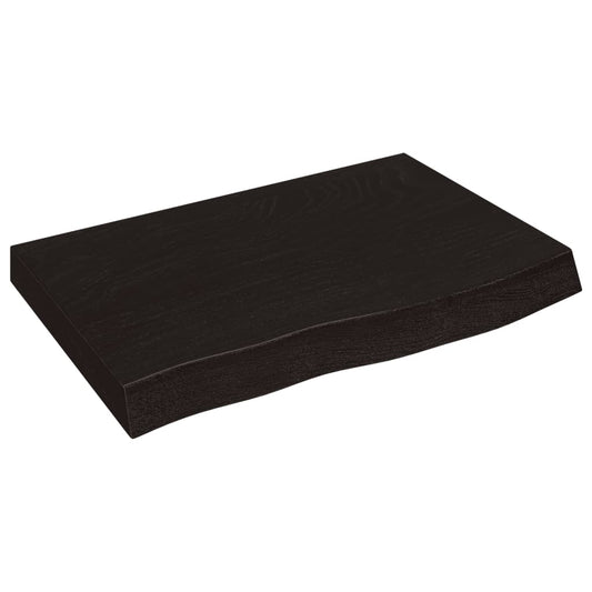 Dark brown treated solid wood bathroom countertop with a subtle wave edge
