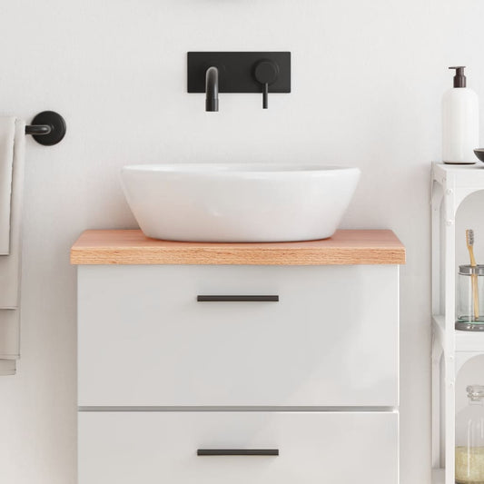 vidaXL Bathroom Countertop Light Brown Solid Wood shown installed with a sink and tap