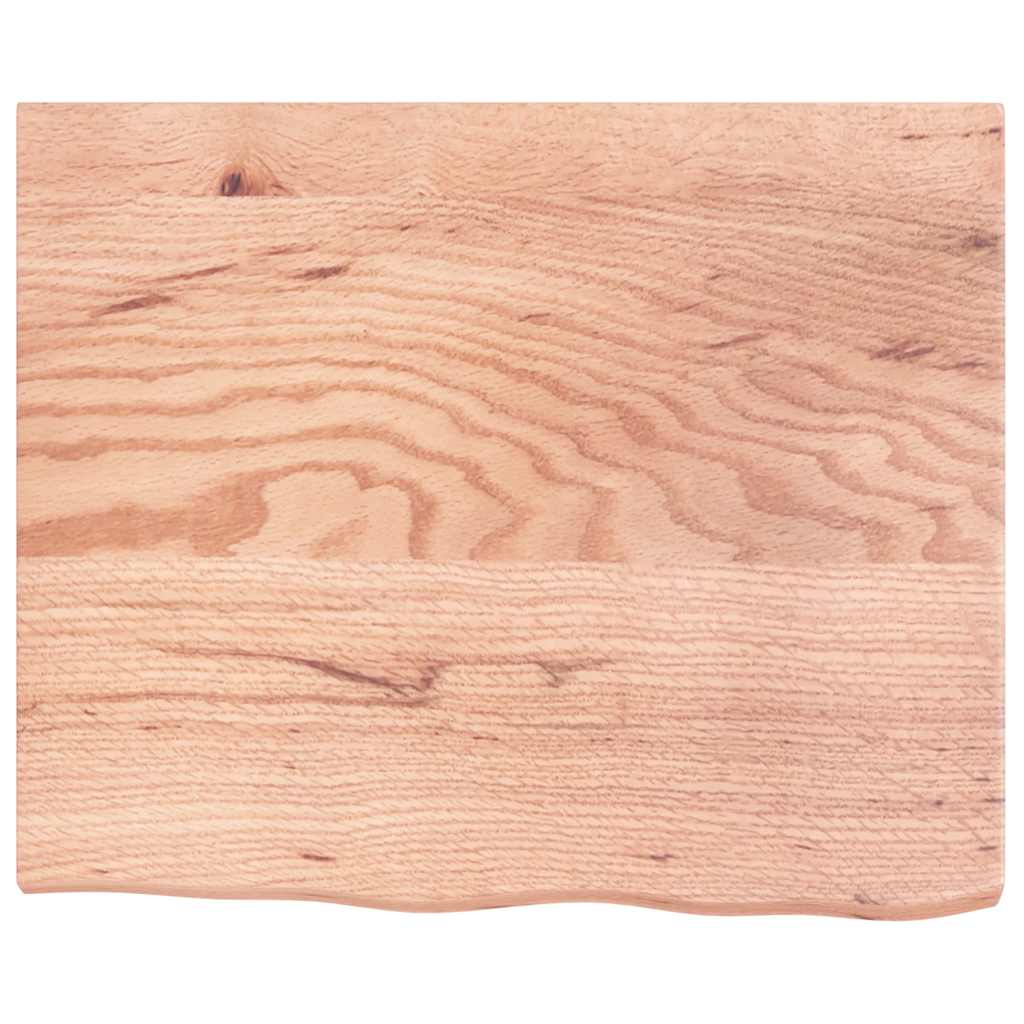The wooden worktop viewed from directly above showing the light brown colour and wood texture