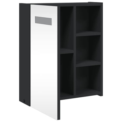 The bathroom vanity unit, showing the mirrored door pulled out to reveal internal shelving
