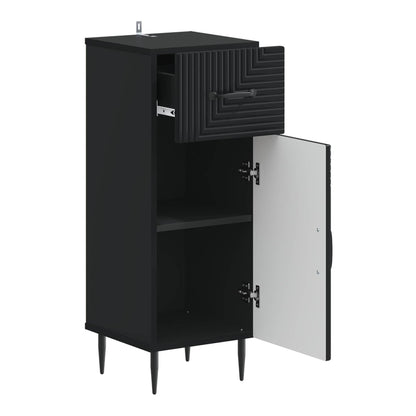The black bathroom cabinet with its door open showing one shelf inside
