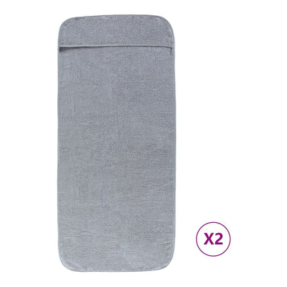 Two grey beach towels, one on top of the other, with a pocket at the top