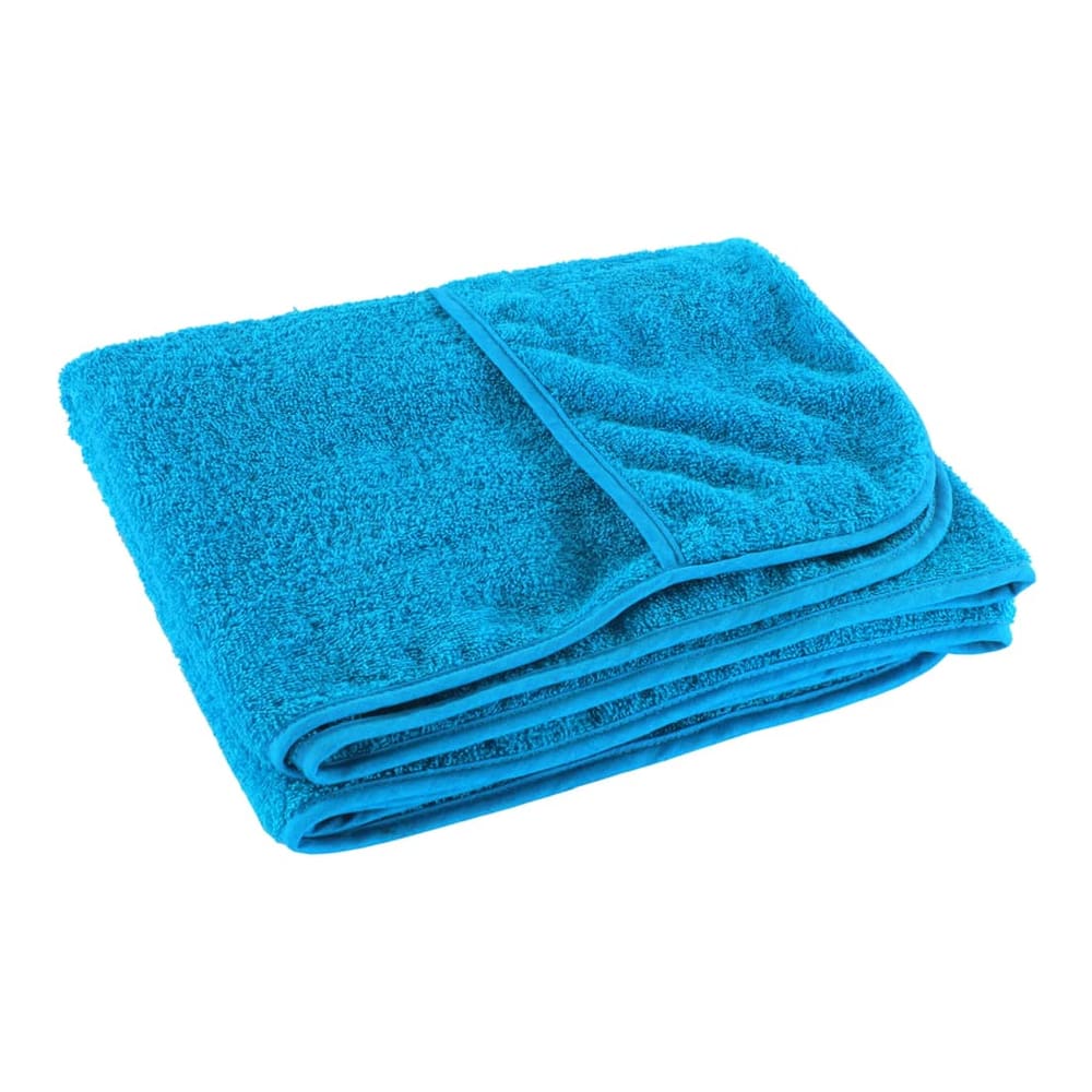 a folded turquoise beach towel showing its soft texture