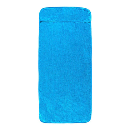 a single turquoise beach towel folded neatly