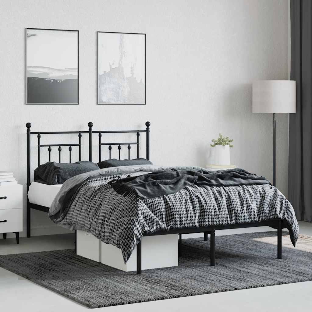 The metal bed frame with headboard in a bedroom setting, dressed with bedding and pillows