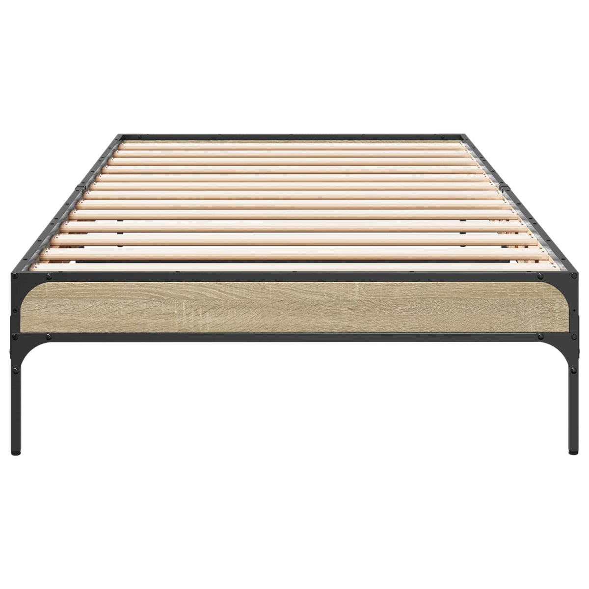 the bed frame viewed from the foot end showing the metal legs and wooden panel