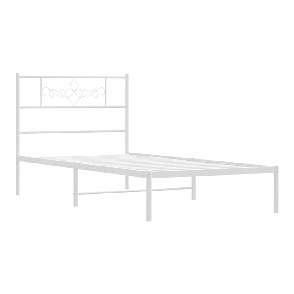 The white metal bed frame without a mattress