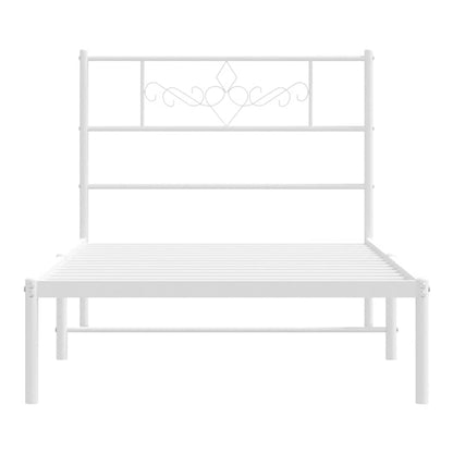 The white metal bed frame without mattress