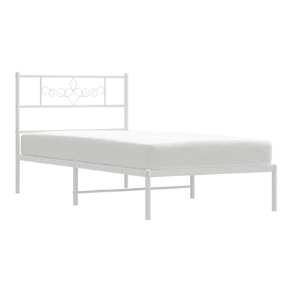 The white metal bed frame with mattress