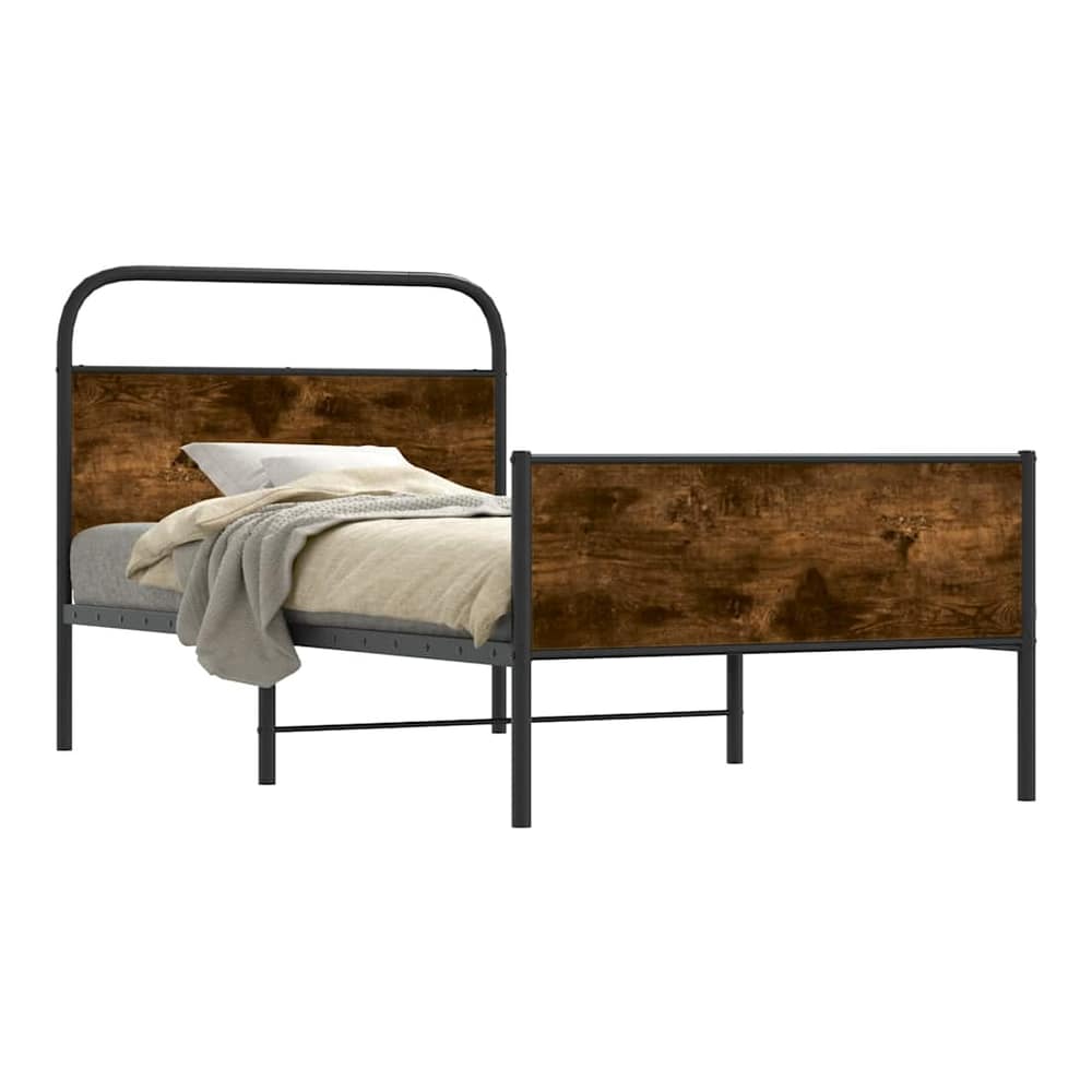 The metal bed frame with wooden effect headboard and footboard, shown from the side