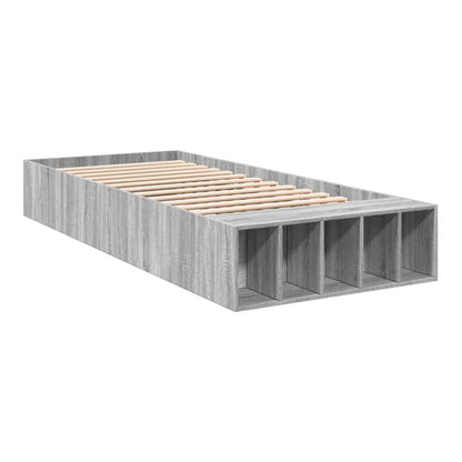 The bed frame without mattress showing the slatted base and storage compartments