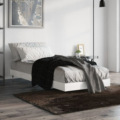 vidaXL Bed Frame without Mattress High Gloss White set up in a bedroom with bedding and a blanket
