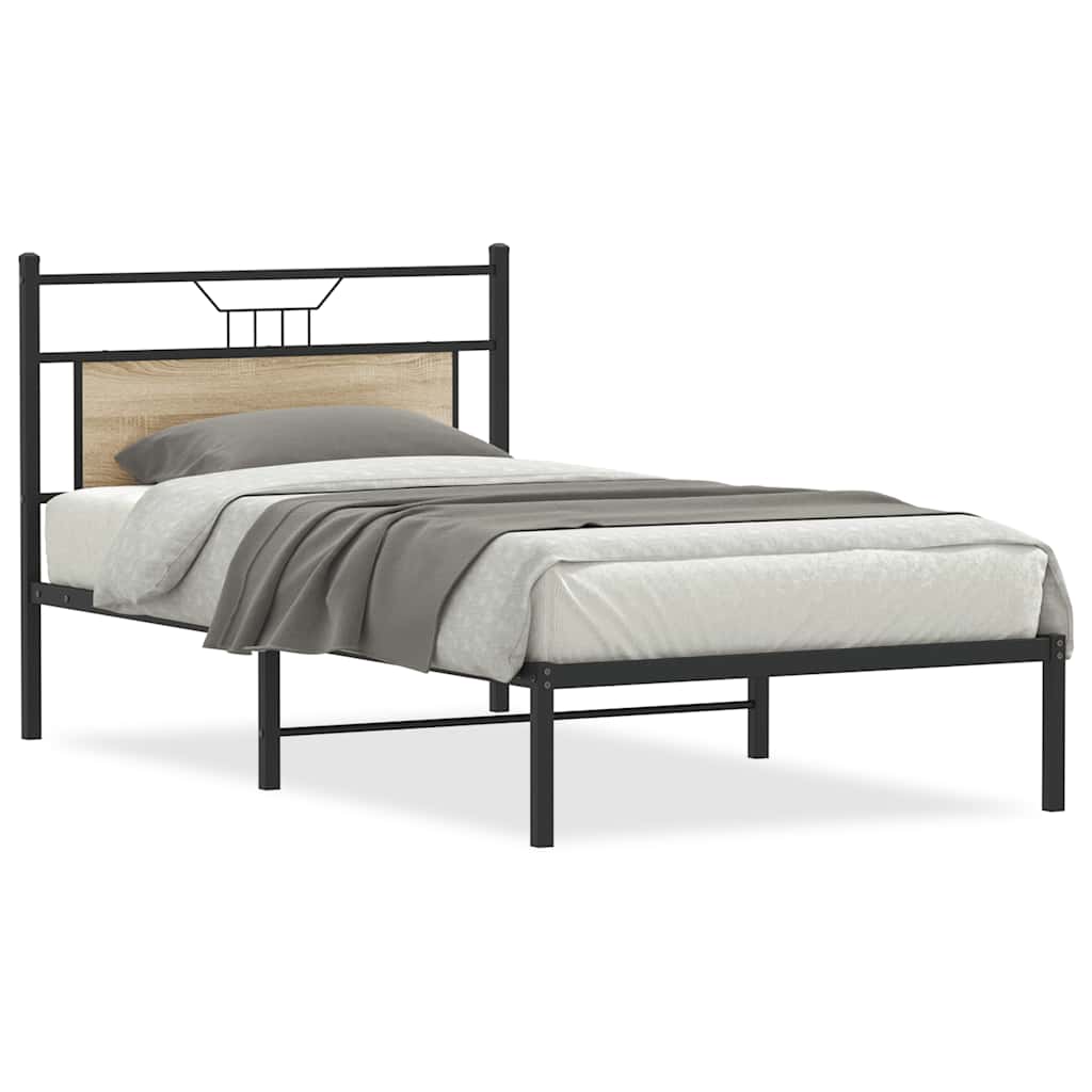 The single bed frame with a grey blanket and pillow on a white mattress