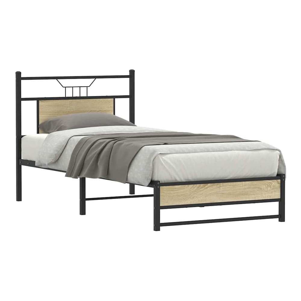 The bed frame without mattress, showing the headboard and footboard in sonoma oak effect