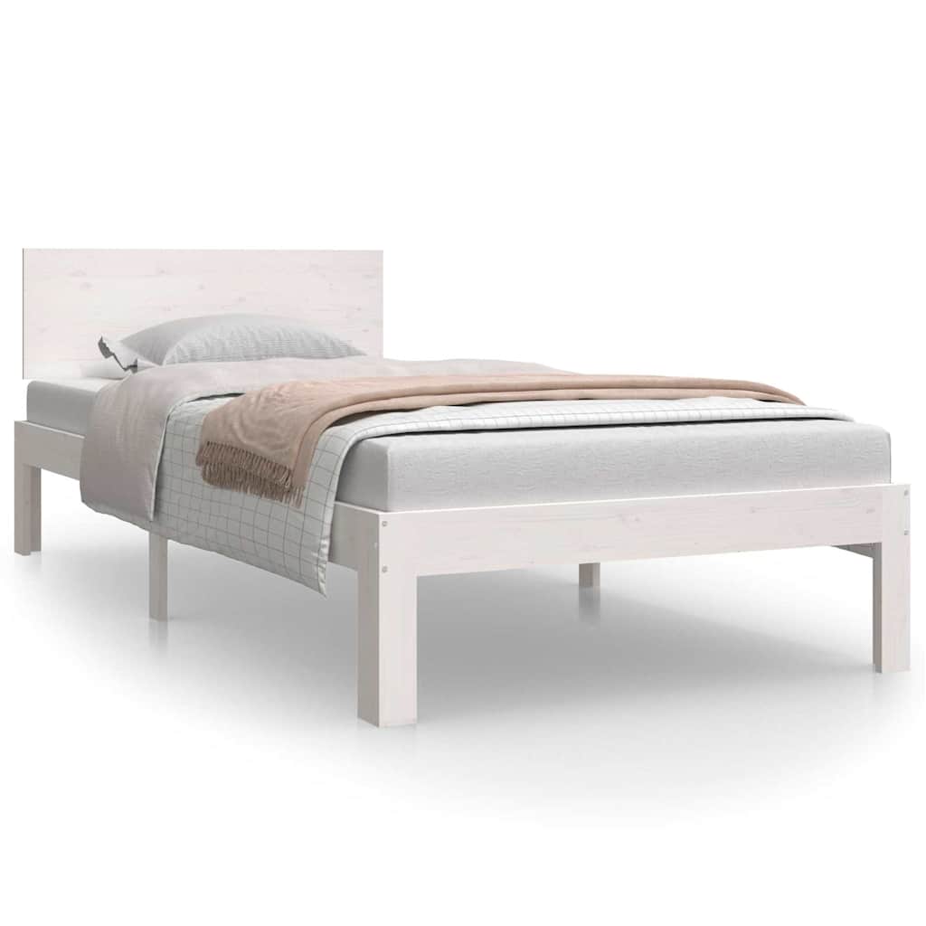 The white wooden bed frame dressed with a mattress and bedding against a plain white background