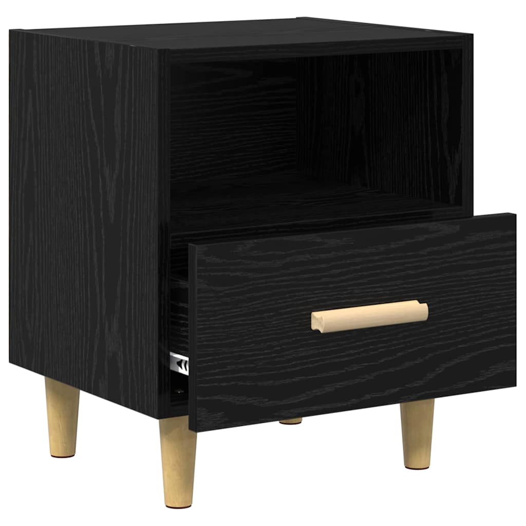 The bedside table with its single drawer pulled out to show the metal runner