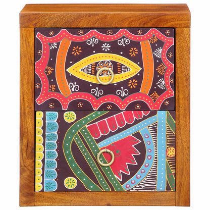 Close up of the decorative pattern on the bedside cabinet drawers