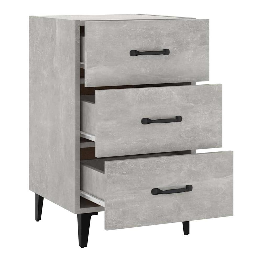 The bedside table with three drawers, two of which are open showing the inside
