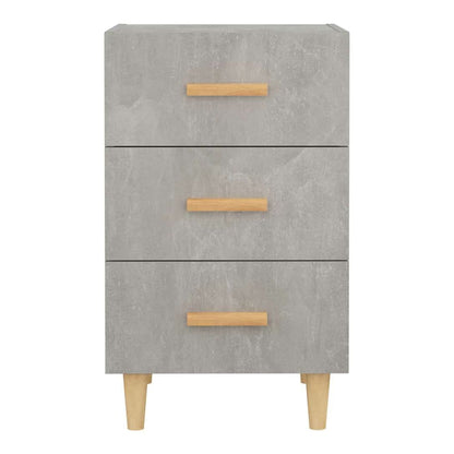 Bedside cabinet in a concrete grey finish with three drawers and wooden handles
