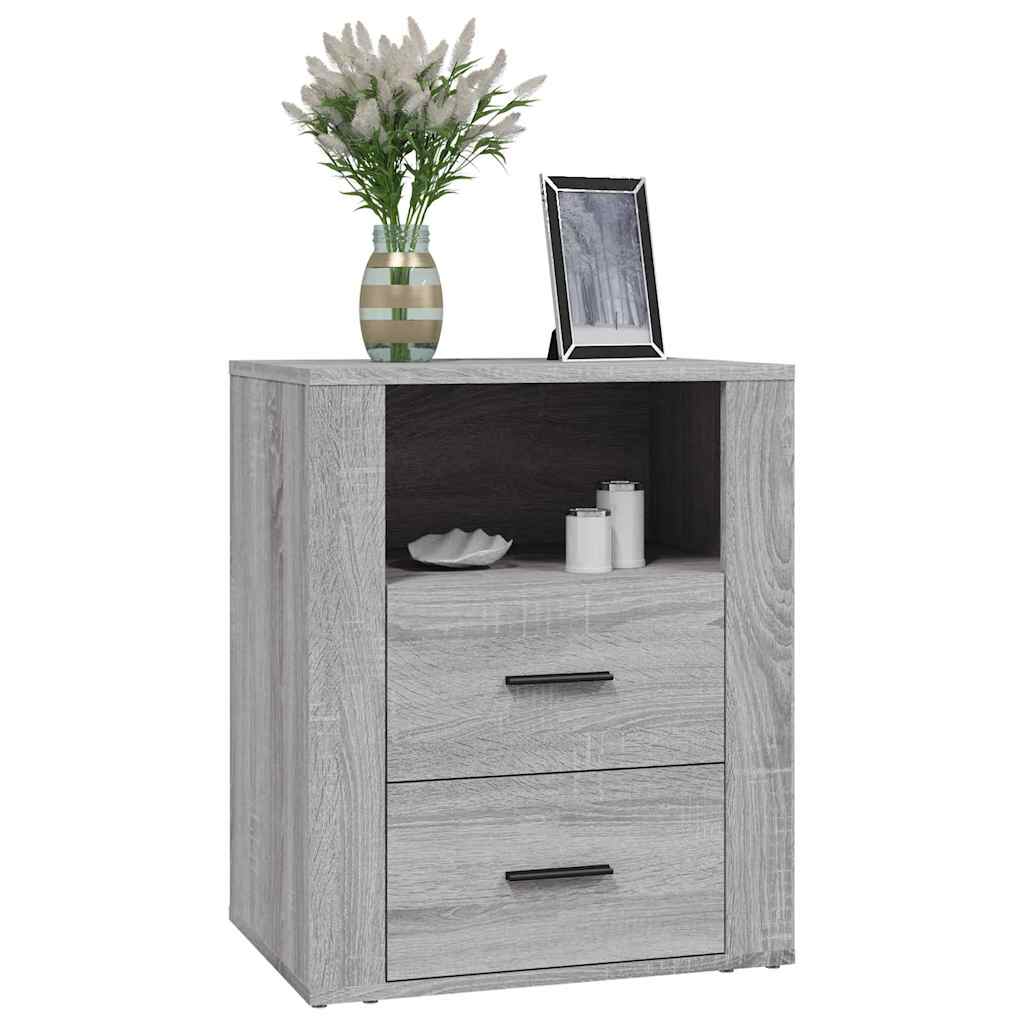 The bedside table with a lamp and vase on top and one drawer open