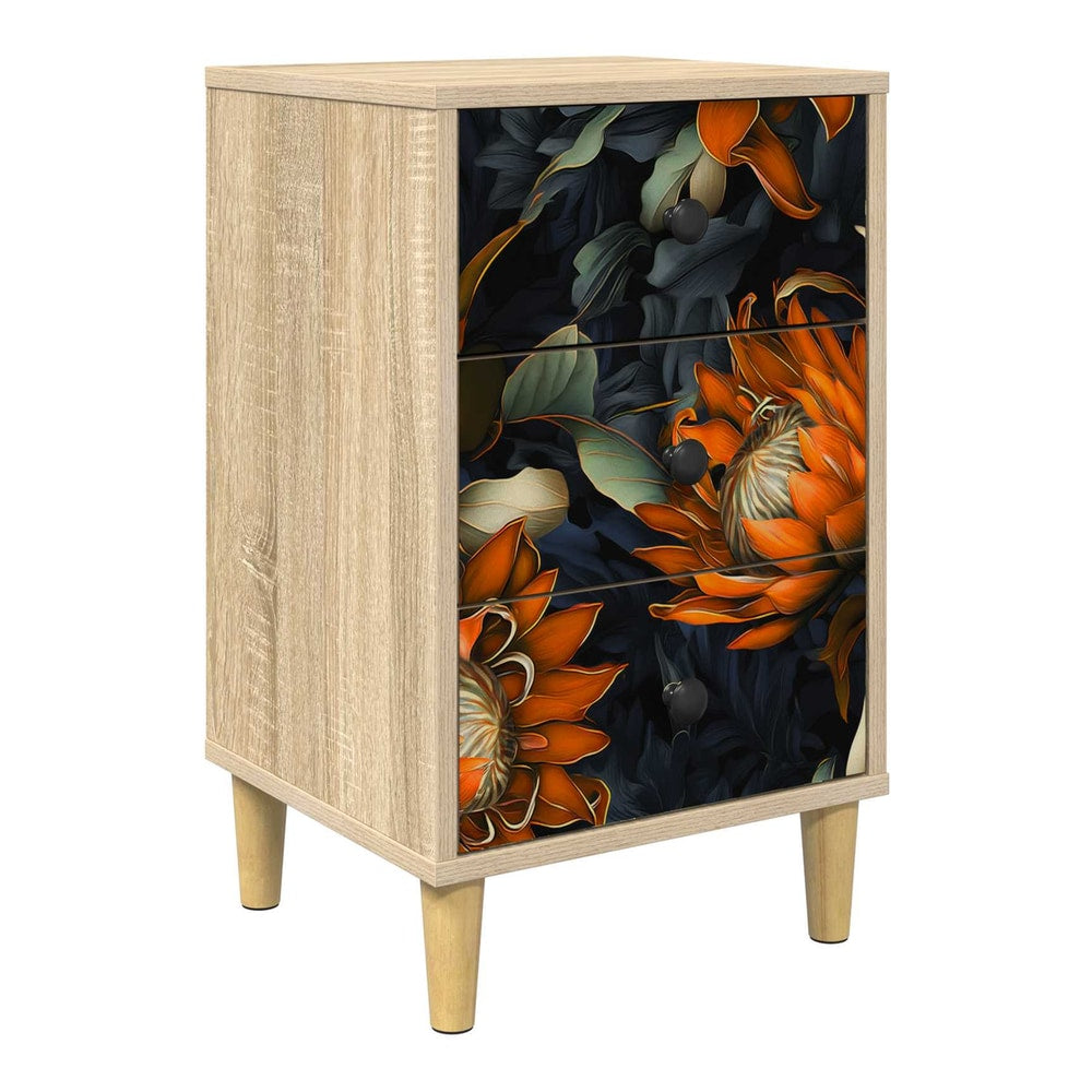 bedside cabinet with a floral design on the drawers and wooden legs