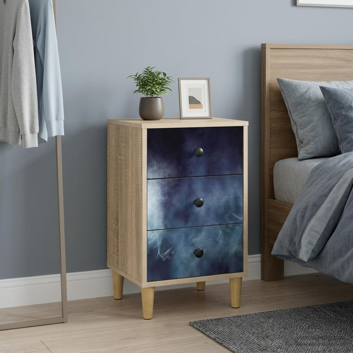 vidaXL Bedside Cabinet RAALTE Sonoma Oak with three drawers featuring a dark blue abstract design