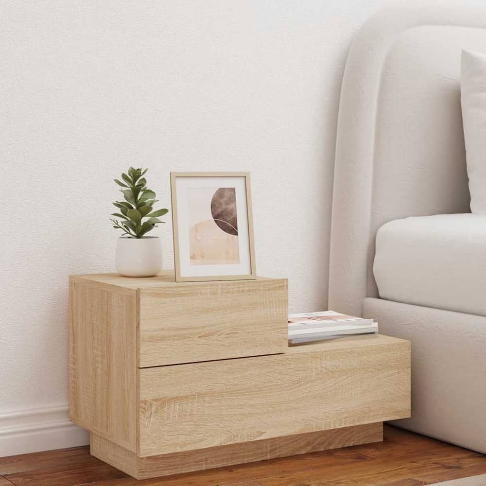 Bedside cabinet with LED lights in a bedroom setting next to a bed