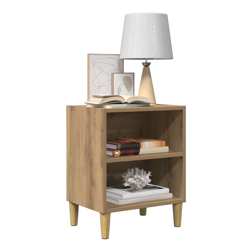 Bedside table with a lamp and books on it