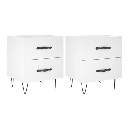 Two white bedside cabinets with black hairpin legs and decorative handles