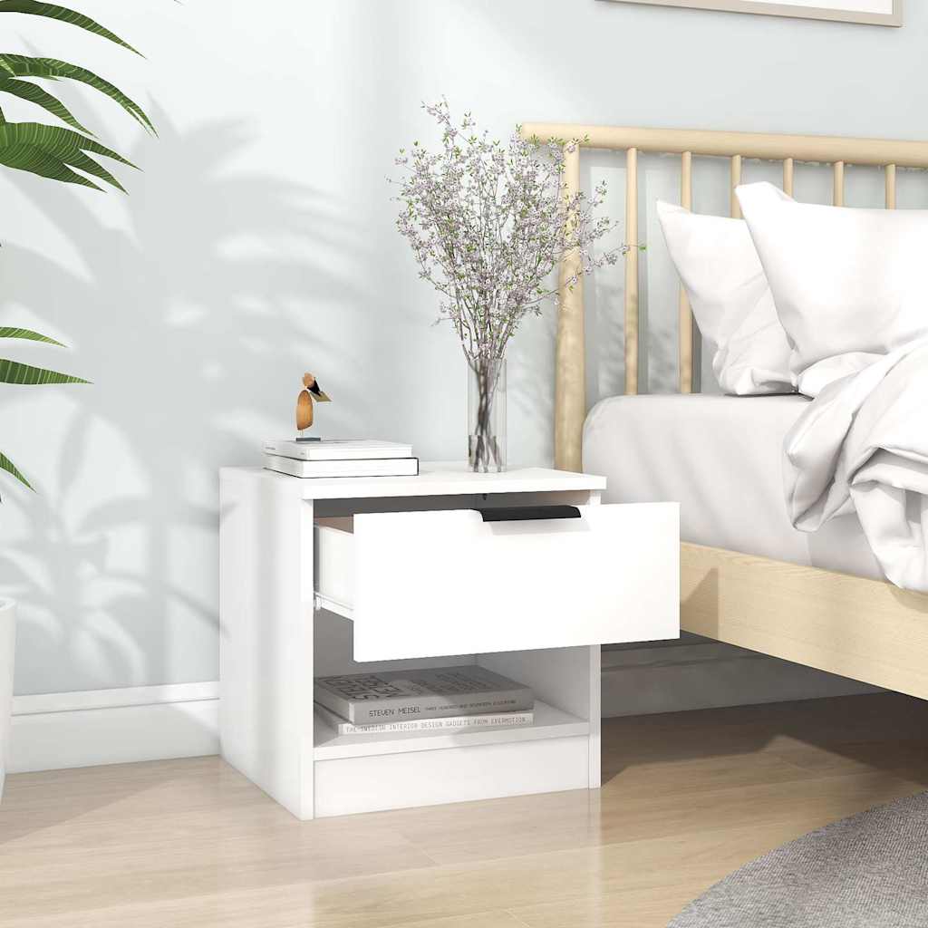 White bedside cabinet with drawer open showing storage space