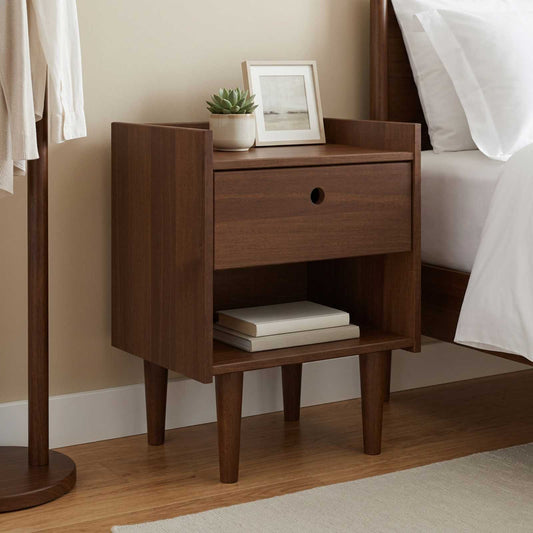 vidaXL Bedside Table BILBAO Dark Caramel next to a bed with a plant and picture on top