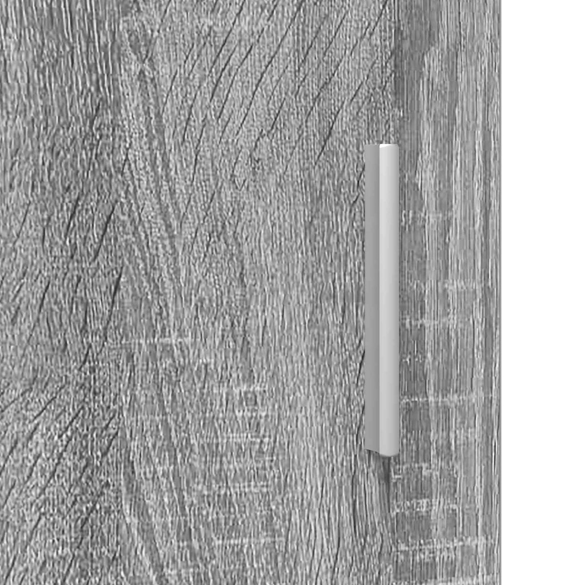Close-up of the grey wood grain effect on the bedside table door and silver handle
