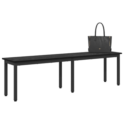 The black wooden bench with a grey handbag resting on the seat surface