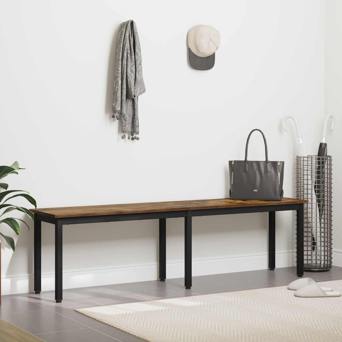 The wooden bench with black legs is in a hallway with coats and bags
