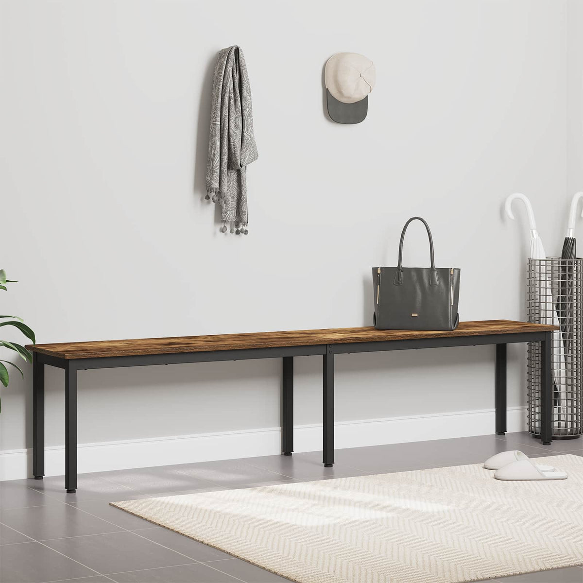 the hallway bench positioned against a wall with a scarf and hat hanging above it