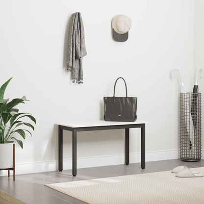 The white pine wood bench with black metal legs in a hallway with coat and hat