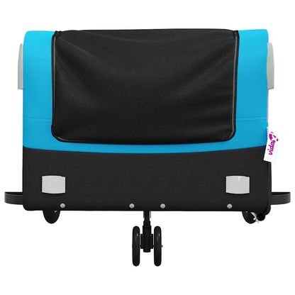 The front of the bicycle trailer with its small front wheels and reflectors