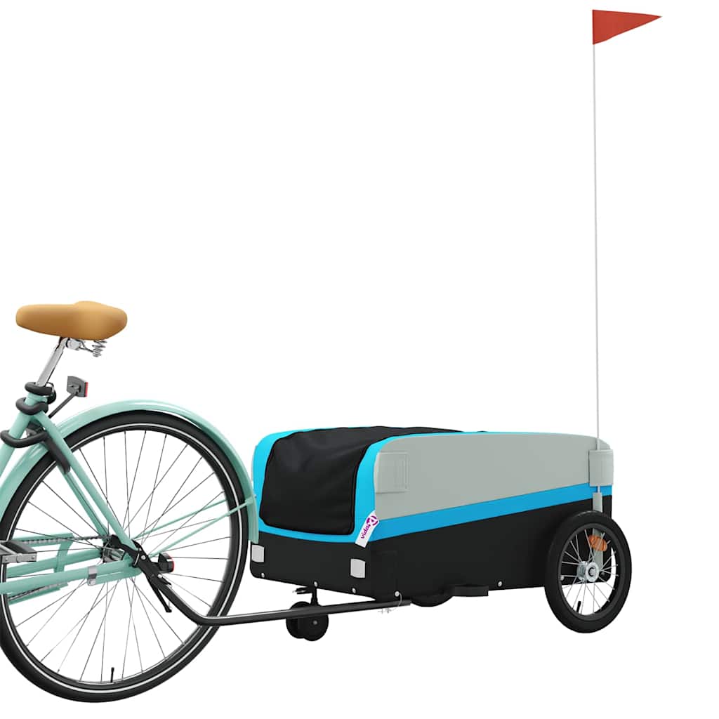 The black and blue bicycle trailer connected to the rear wheel of a bicycle
