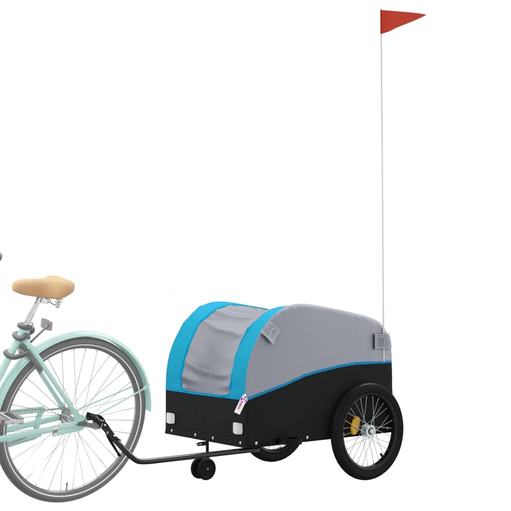 The black and blue bicycle trailer is hitched to the back wheel of a bicycle