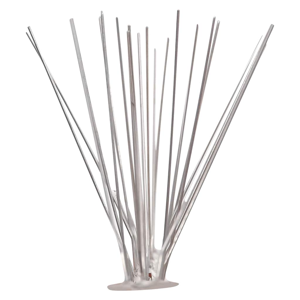 Close-up of the stainless steel prongs of the bird spikes, fanned out