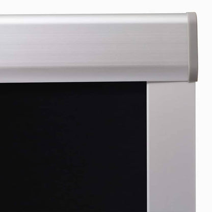 close up of the top aluminium bar of a black blackout roller blind