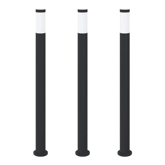 the bollard lights standing in a row against a plain white background
